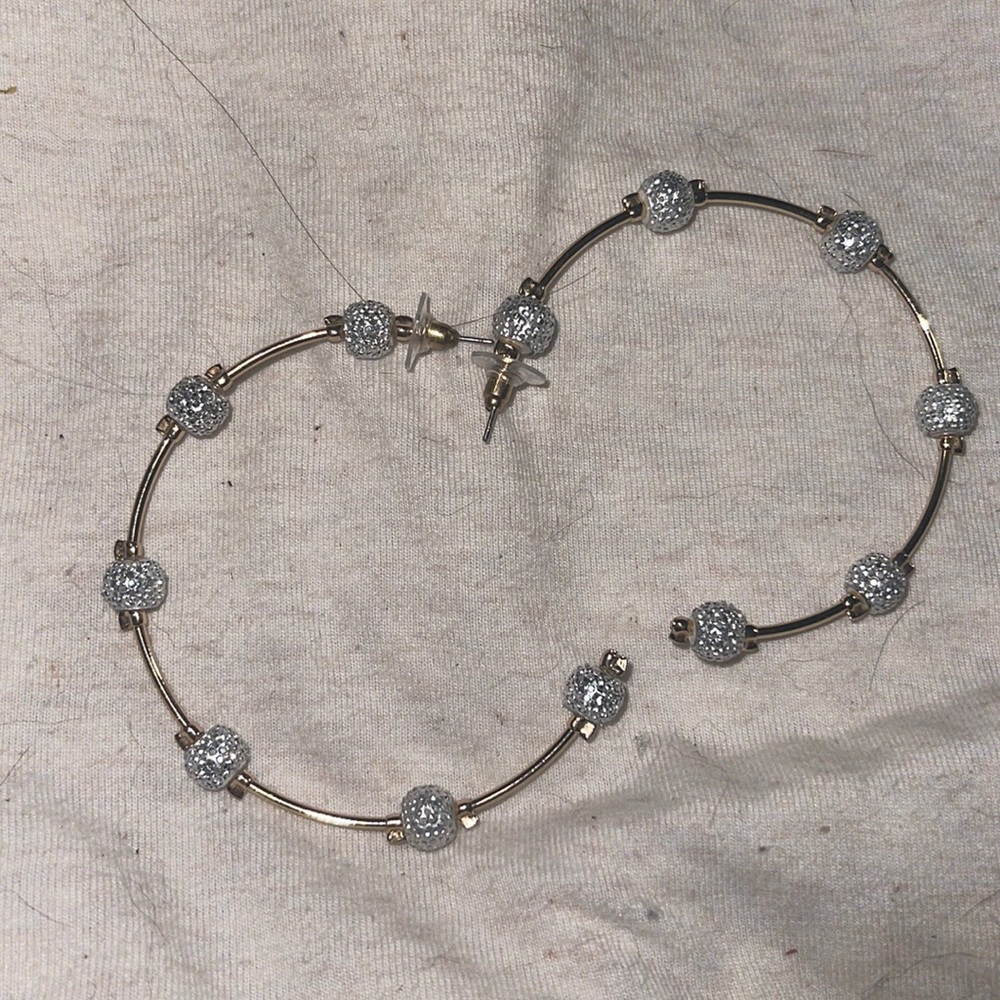 Gold and silver hoop earrings